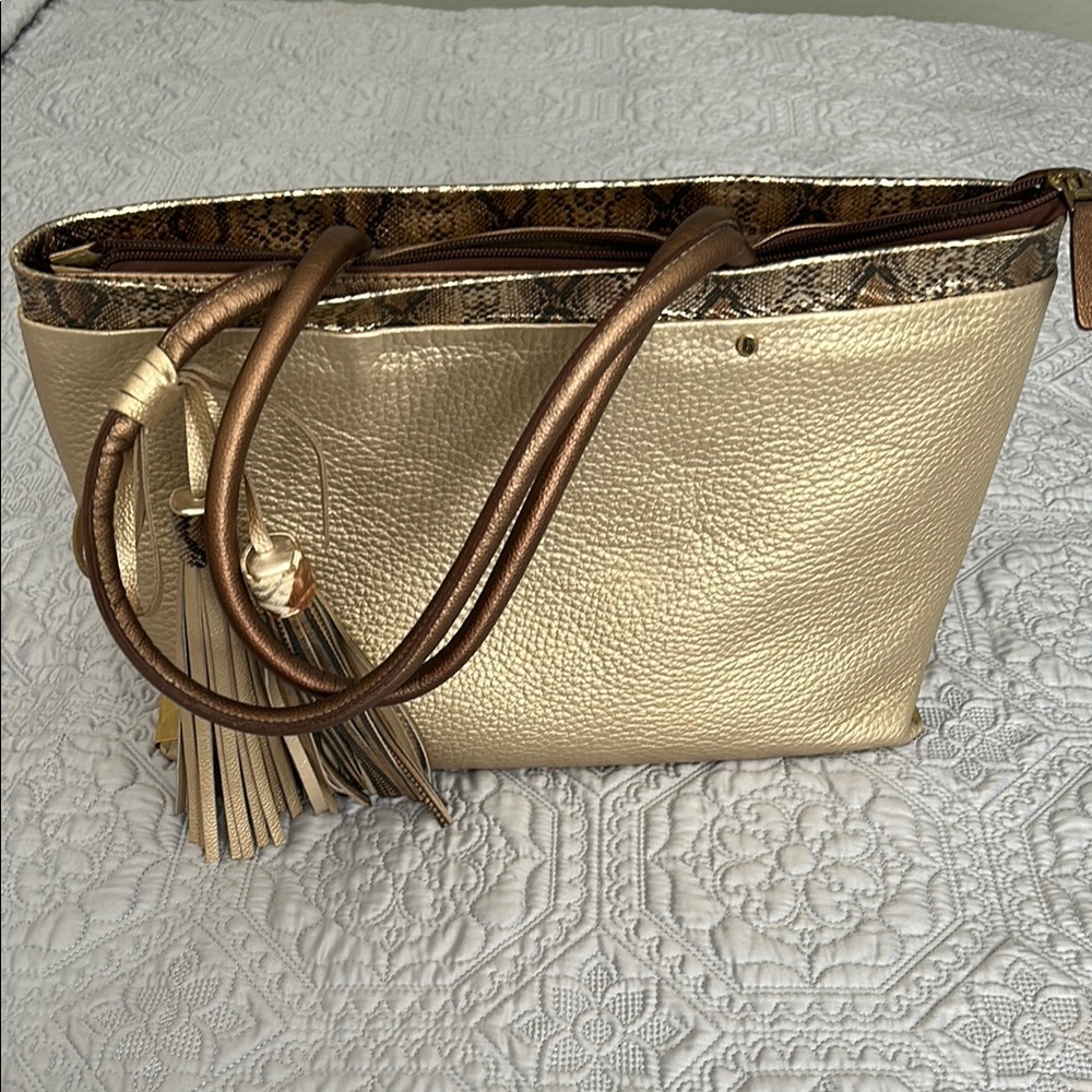 Elegant Gold Tote Bag with Tassel Accent